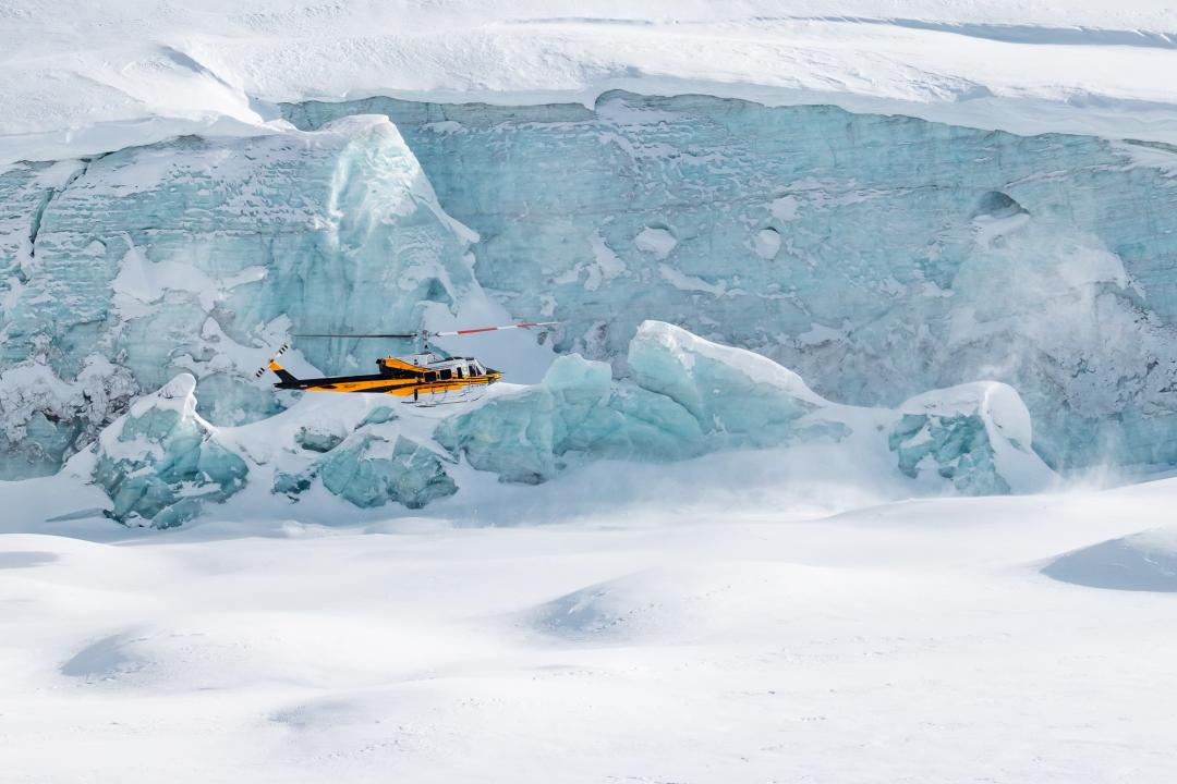 Heli in front of glacier