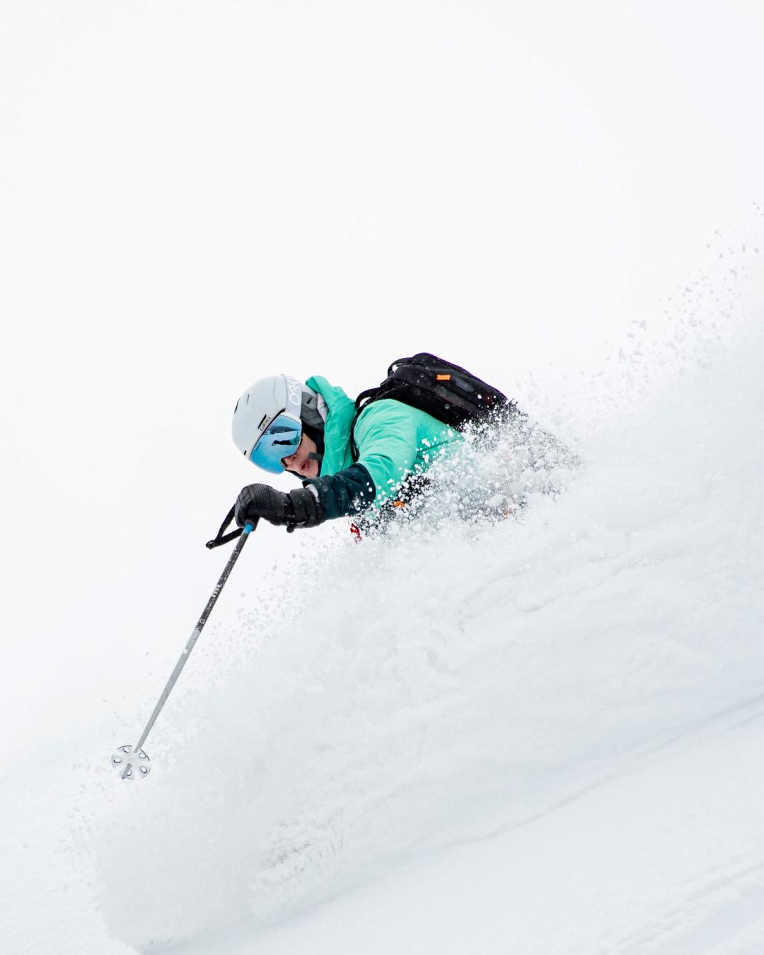 Guest skiing deep powder