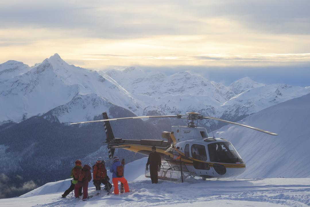 Heli-skiers in the Alpine