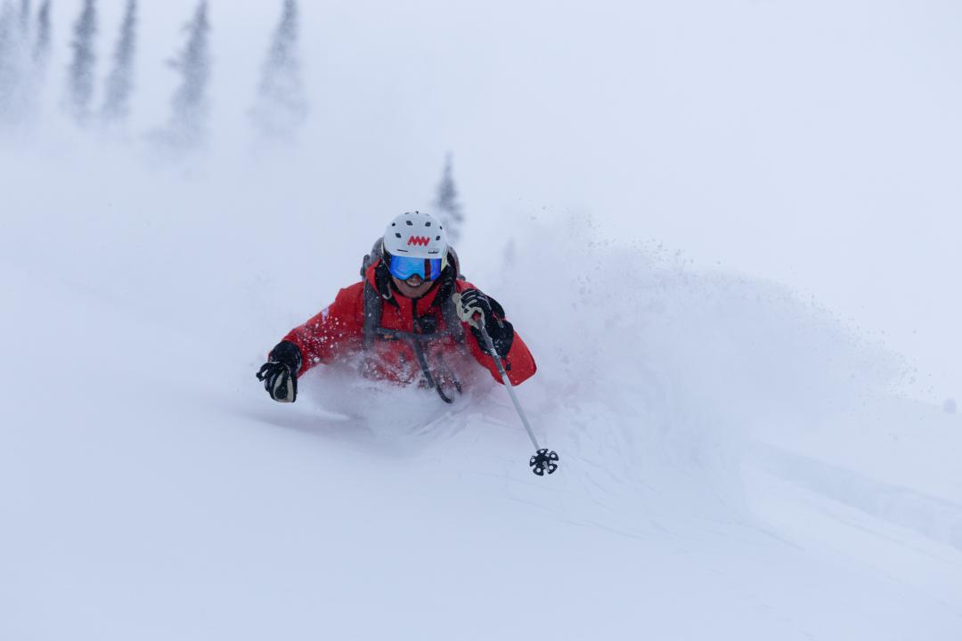 Guide Mike Hainault in deep powder