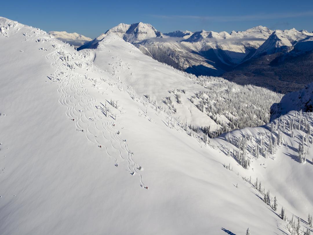 Group skiing down ridge