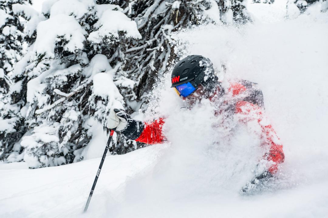 Guide Jason in deep powder