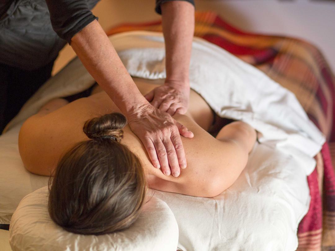 Restorative and sports massage after skiing at Mike Wiegele Heli-ski Resort, BC, Canada