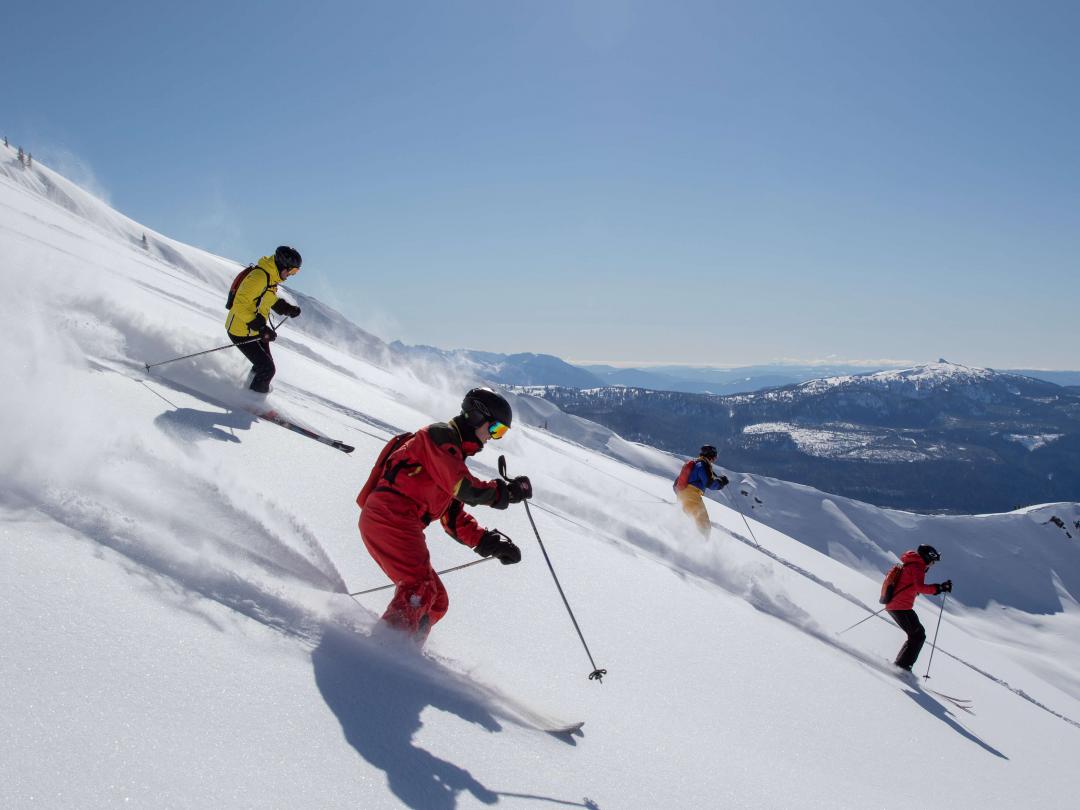 Mike Wiegele Heli-ski Resort in Canada offers best powder snowboarding and skiing.