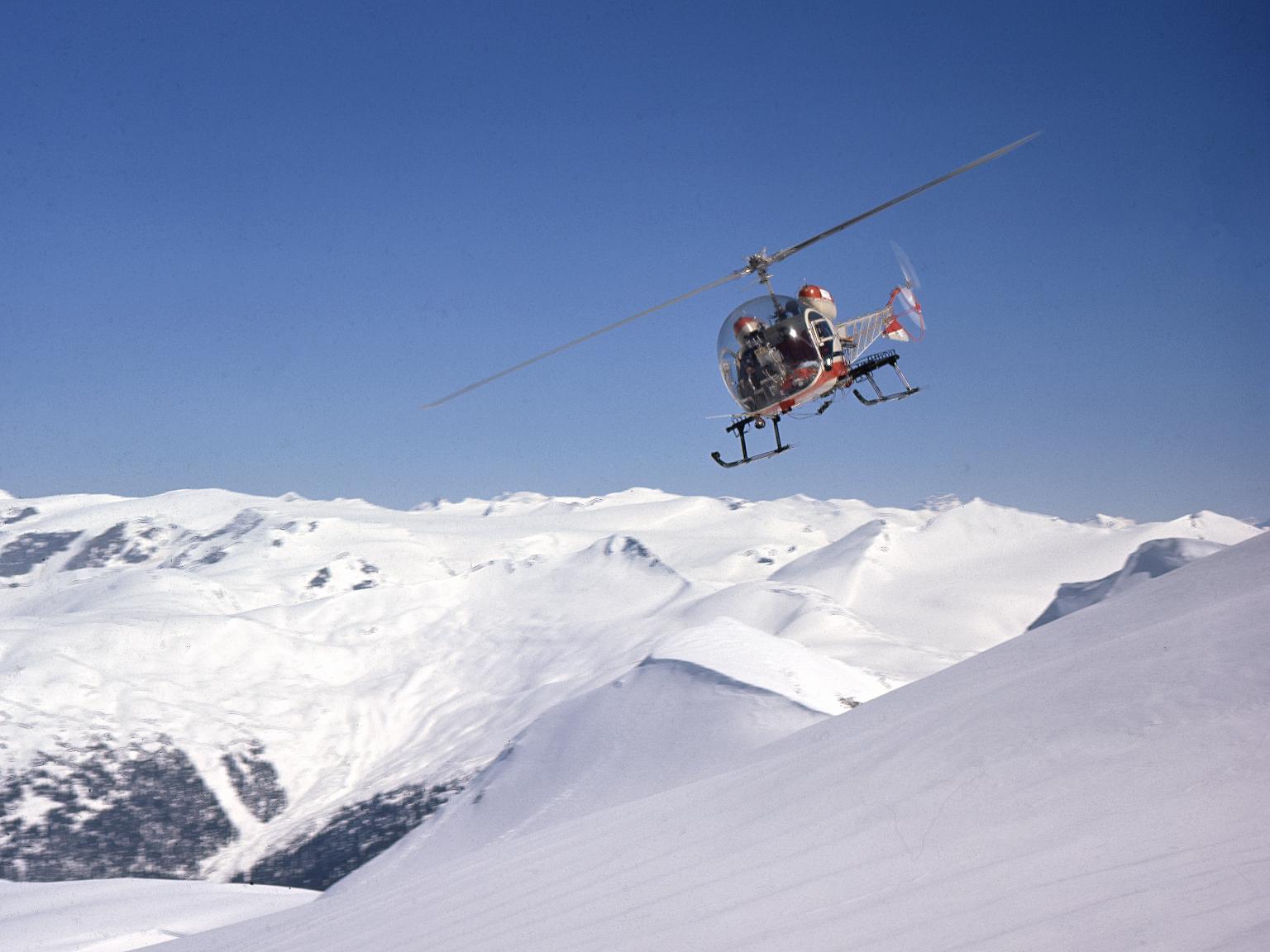 Helicopter Skiing in 1960 with pioneer Mike Wiegele Heli-skiing.